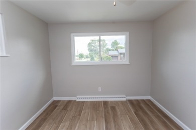 Tastefully remodeled 3 bedroom 2 bath ranch home in a desirable on Uniontown Country Club in Pennsylvania - for sale on GolfHomes.com, golf home, golf lot