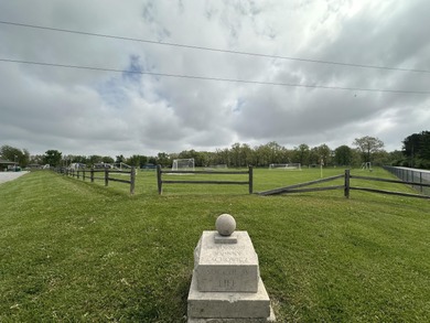 Build your new home on this lot in Lakes of the Four Seasons! on Lakes of the Four Seasons Country Club in Indiana - for sale on GolfHomes.com, golf home, golf lot