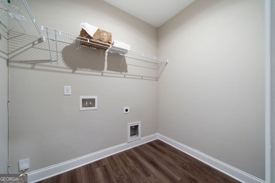 Discover life in The Georgian, one of Villa Rica's most on The Frog Golf Club in Georgia - for sale on GolfHomes.com, golf home, golf lot