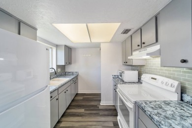 PRICE REDUCED on this freshly renovated oversized corner unit on Country Club At Silver Springs Shores in Florida - for sale on GolfHomes.com, golf home, golf lot