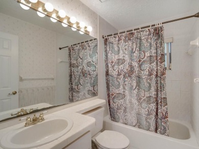Location! Location! Lovely 3 bedroom 2 bath villa style single on East Lake Woodlands Country Club in Florida - for sale on GolfHomes.com, golf home, golf lot