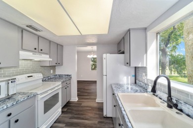 PRICE REDUCED on this freshly renovated oversized corner unit on Country Club At Silver Springs Shores in Florida - for sale on GolfHomes.com, golf home, golf lot