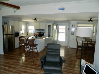 This 1984 Sherman home is 24x40 offering you 960 sq ft of open on Grasslands Golf and Country Club in Florida - for sale on GolfHomes.com, golf home, golf lot