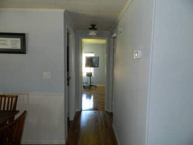 This 1984 Sherman home is 24x40 offering you 960 sq ft of open on Grasslands Golf and Country Club in Florida - for sale on GolfHomes.com, golf home, golf lot