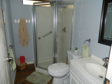 This 1984 Sherman home is 24x40 offering you 960 sq ft of open on Grasslands Golf and Country Club in Florida - for sale on GolfHomes.com, golf home, golf lot