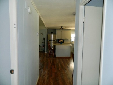 This 1984 Sherman home is 24x40 offering you 960 sq ft of open on Grasslands Golf and Country Club in Florida - for sale on GolfHomes.com, golf home, golf lot