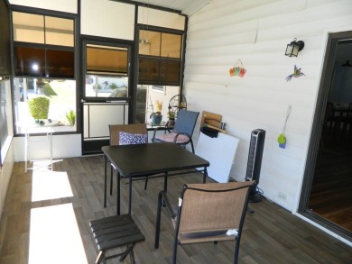This 1984 Sherman home is 24x40 offering you 960 sq ft of open on Grasslands Golf and Country Club in Florida - for sale on GolfHomes.com, golf home, golf lot