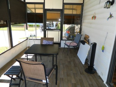 This 1984 Sherman home is 24x40 offering you 960 sq ft of open on Grasslands Golf and Country Club in Florida - for sale on GolfHomes.com, golf home, golf lot
