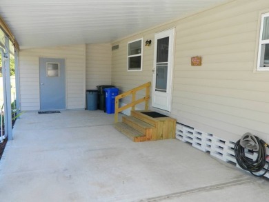 This 1984 Sherman home is 24x40 offering you 960 sq ft of open on Grasslands Golf and Country Club in Florida - for sale on GolfHomes.com, golf home, golf lot