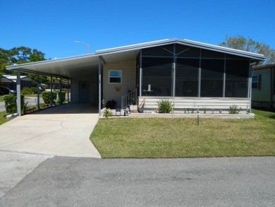 This 1984 Sherman home is 24x40 offering you 960 sq ft of open on Grasslands Golf and Country Club in Florida - for sale on GolfHomes.com, golf home, golf lot