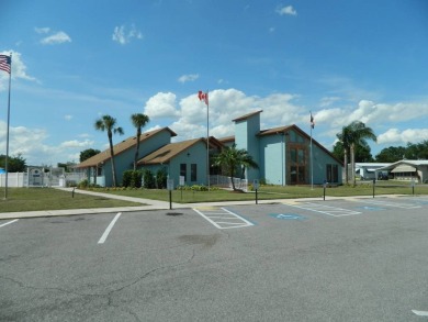 This 1984 Sherman home is 24x40 offering you 960 sq ft of open on Grasslands Golf and Country Club in Florida - for sale on GolfHomes.com, golf home, golf lot