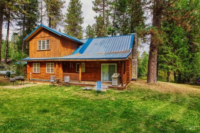 Charming and beautiful log home perfectly located on the 18th on Terrace Lakes Golf Resort in Idaho - for sale on GolfHomes.com, golf home, golf lot