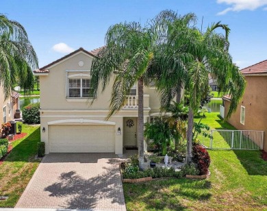 Welcome to 21196 Via Ventura, a rare lakefront estate in Boca on Boca Lago Golf and Country Club in Florida - for sale on GolfHomes.com, golf home, golf lot