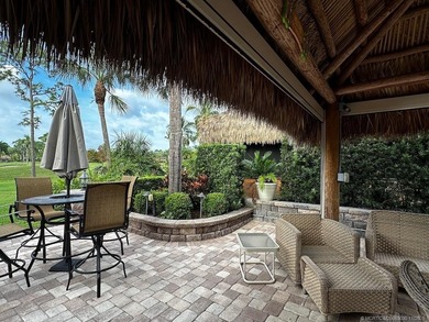 This stunning property is a masterpiece of elegance and on St. Lucie Trail Golf Club in Florida - for sale on GolfHomes.com, golf home, golf lot