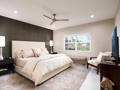 Fully renovated in 2024, this stunning first-floor end-unit on PGA National Golf Club in Florida - for sale on GolfHomes.com, golf home, golf lot