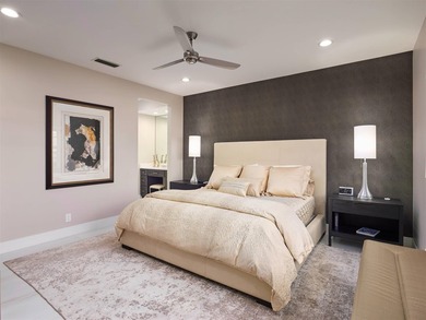 Fully renovated in 2024, this stunning first-floor end-unit on PGA National Golf Club in Florida - for sale on GolfHomes.com, golf home, golf lot