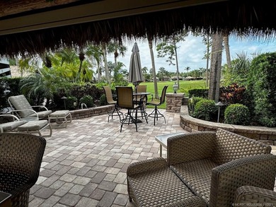 This stunning property is a masterpiece of elegance and on St. Lucie Trail Golf Club in Florida - for sale on GolfHomes.com, golf home, golf lot