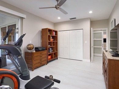 Fully renovated in 2024, this stunning first-floor end-unit on PGA National Golf Club in Florida - for sale on GolfHomes.com, golf home, golf lot