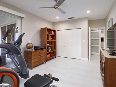 Fully renovated in 2024, this stunning first-floor end-unit on PGA National Golf Club in Florida - for sale on GolfHomes.com, golf home, golf lot