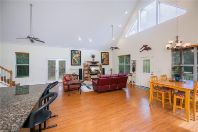 CUSTOM A-FRAME*LAKEFRONT HOME* | 3 Beds | 2 Baths | 1.5-Car on Seminole Lakes Country Club in Florida - for sale on GolfHomes.com, golf home, golf lot