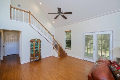 CUSTOM A-FRAME*LAKEFRONT HOME* | 3 Beds | 2 Baths | 1.5-Car on Seminole Lakes Country Club in Florida - for sale on GolfHomes.com, golf home, golf lot