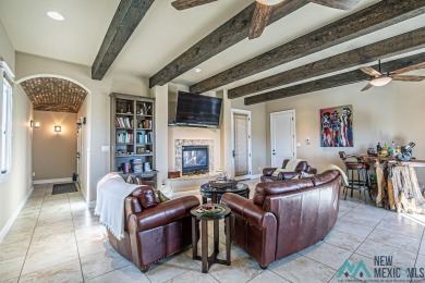 This stunning Tuscany-style home in the Turtleback Mountain on Sierra Del Rio Golf Club in New Mexico - for sale on GolfHomes.com, golf home, golf lot