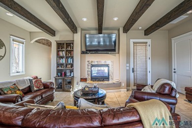 This stunning Tuscany-style home in the Turtleback Mountain on Sierra Del Rio Golf Club in New Mexico - for sale on GolfHomes.com, golf home, golf lot