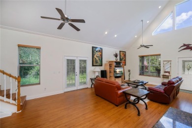 CUSTOM A-FRAME*LAKEFRONT HOME* | 3 Beds | 2 Baths | 1.5-Car on Seminole Lakes Country Club in Florida - for sale on GolfHomes.com, golf home, golf lot