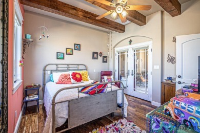 This stunning Tuscany-style home in the Turtleback Mountain on Sierra Del Rio Golf Club in New Mexico - for sale on GolfHomes.com, golf home, golf lot