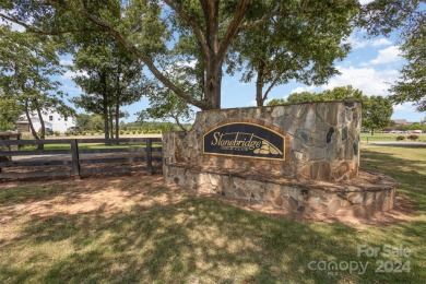 Discover your perfect retreat in Stonebridge Fairways on Stonebridge Golf Club in North Carolina - for sale on GolfHomes.com, golf home, golf lot