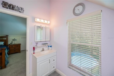 CUSTOM A-FRAME*LAKEFRONT HOME* | 3 Beds | 2 Baths | 1.5-Car on Seminole Lakes Country Club in Florida - for sale on GolfHomes.com, golf home, golf lot