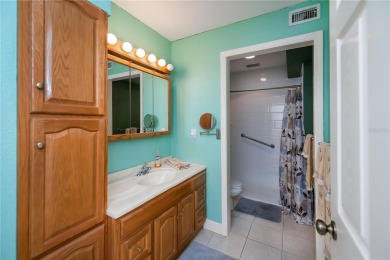 CUSTOM A-FRAME*LAKEFRONT HOME* | 3 Beds | 2 Baths | 1.5-Car on Seminole Lakes Country Club in Florida - for sale on GolfHomes.com, golf home, golf lot