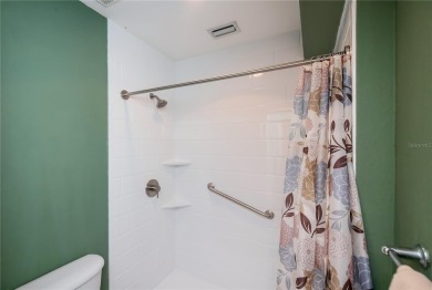 CUSTOM A-FRAME*LAKEFRONT HOME* | 3 Beds | 2 Baths | 1.5-Car on Seminole Lakes Country Club in Florida - for sale on GolfHomes.com, golf home, golf lot