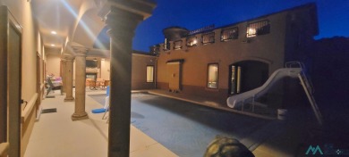 This stunning Tuscany-style home in the Turtleback Mountain on Sierra Del Rio Golf Club in New Mexico - for sale on GolfHomes.com, golf home, golf lot