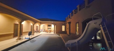 This stunning Tuscany-style home in the Turtleback Mountain on Sierra Del Rio Golf Club in New Mexico - for sale on GolfHomes.com, golf home, golf lot