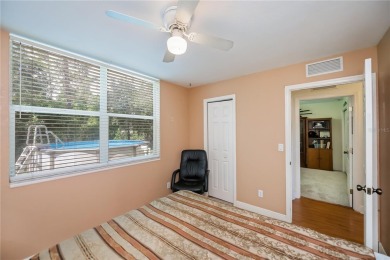 CUSTOM A-FRAME*LAKEFRONT HOME* | 3 Beds | 2 Baths | 1.5-Car on Seminole Lakes Country Club in Florida - for sale on GolfHomes.com, golf home, golf lot