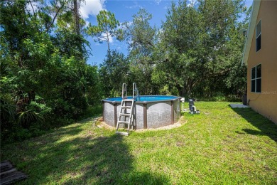 CUSTOM A-FRAME*LAKEFRONT HOME* | 3 Beds | 2 Baths | 1.5-Car on Seminole Lakes Country Club in Florida - for sale on GolfHomes.com, golf home, golf lot