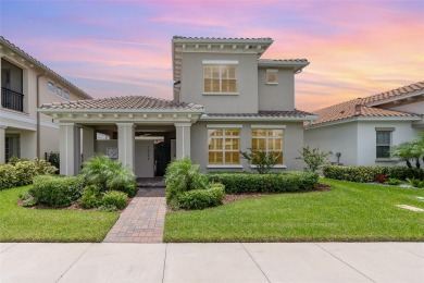 Discover this immaculate two-story Mediterranean-style home in on Eagle Creek Golf Club in Florida - for sale on GolfHomes.com, golf home, golf lot