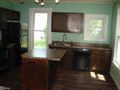 Don't miss out on this well-maintained 1.5-story, 3-bedroom on Twin Lakes Golf Course in Iowa - for sale on GolfHomes.com, golf home, golf lot