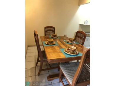 UNIT WITH NEW AIR CONDITIONING, NEW WATER HEATER, NEW FRENCH on Hillsboro Pines Golf in Florida - for sale on GolfHomes.com, golf home, golf lot
