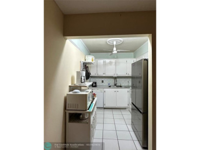 UNIT WITH NEW AIR CONDITIONING, NEW WATER HEATER, NEW FRENCH on Hillsboro Pines Golf in Florida - for sale on GolfHomes.com, golf home, golf lot