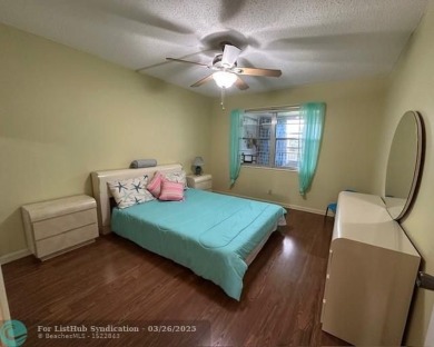 UNIT WITH NEW AIR CONDITIONING, NEW WATER HEATER, NEW FRENCH on Hillsboro Pines Golf in Florida - for sale on GolfHomes.com, golf home, golf lot