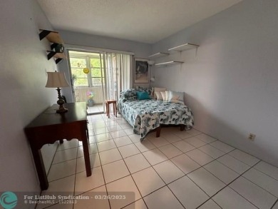 UNIT WITH NEW AIR CONDITIONING, NEW WATER HEATER, NEW FRENCH on Hillsboro Pines Golf in Florida - for sale on GolfHomes.com, golf home, golf lot
