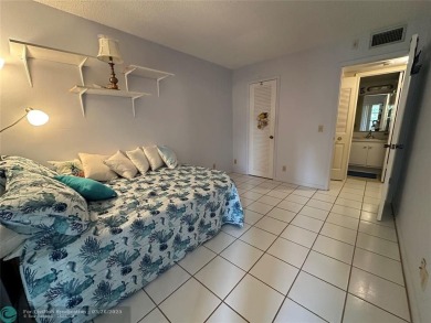 UNIT WITH NEW AIR CONDITIONING, NEW WATER HEATER, NEW FRENCH on Hillsboro Pines Golf in Florida - for sale on GolfHomes.com, golf home, golf lot