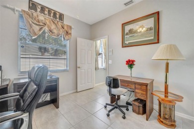 This beautifully maintained 4-bedroom home has been lovingly on Hunters Green Country Club in Florida - for sale on GolfHomes.com, golf home, golf lot