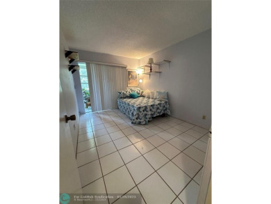 UNIT WITH NEW AIR CONDITIONING, NEW WATER HEATER, NEW FRENCH on Hillsboro Pines Golf in Florida - for sale on GolfHomes.com, golf home, golf lot