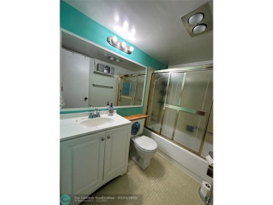 UNIT WITH NEW AIR CONDITIONING, NEW WATER HEATER, NEW FRENCH on Hillsboro Pines Golf in Florida - for sale on GolfHomes.com, golf home, golf lot