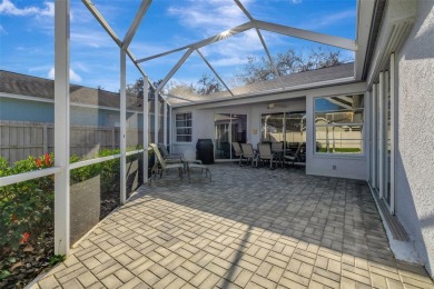 This beautifully maintained 4-bedroom home has been lovingly on Hunters Green Country Club in Florida - for sale on GolfHomes.com, golf home, golf lot