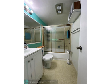 UNIT WITH NEW AIR CONDITIONING, NEW WATER HEATER, NEW FRENCH on Hillsboro Pines Golf in Florida - for sale on GolfHomes.com, golf home, golf lot
