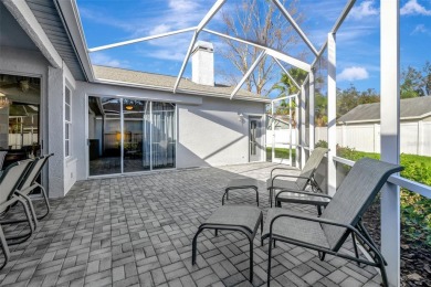 This beautifully maintained 4-bedroom home has been lovingly on Hunters Green Country Club in Florida - for sale on GolfHomes.com, golf home, golf lot